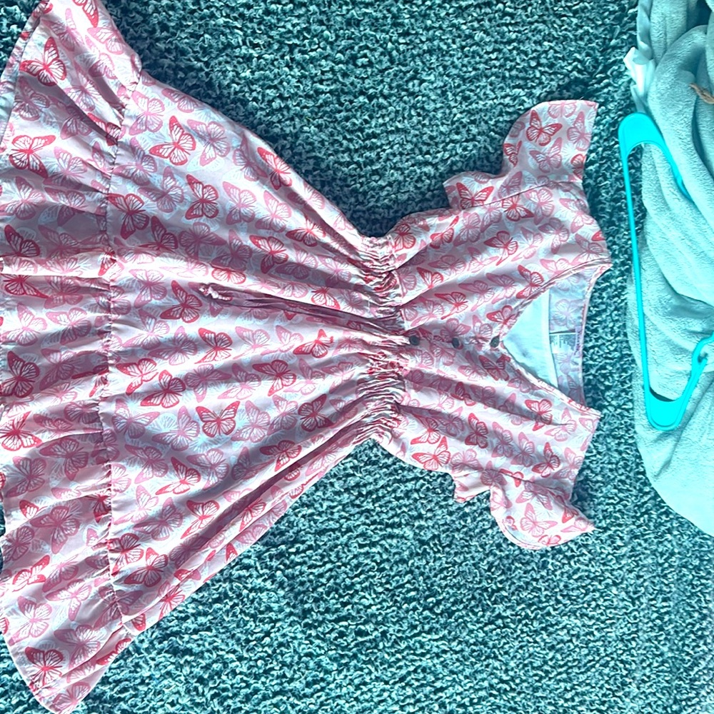 I am selling a butterfly stretchy cowgirl dress